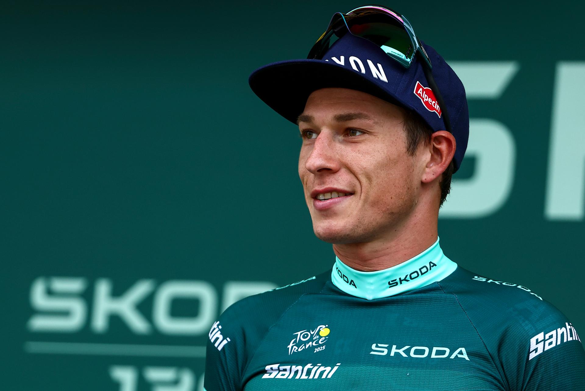 Belgian Jasper Philipsen of Alpecin-Deceuninck celebrates on the podium in the green points jersey the second stage of the 2025 Tour de France cycling race, from Lauwin-Planque to Boulogne-sur-Mer (212 km), on Sunday 06 July 2025 in France. The 112th edition of the Tour de France starts on Saturday 5 July in Lille, and will finish in Paris on the 27th of July. BELGA PHOTO DAVID PINTENS