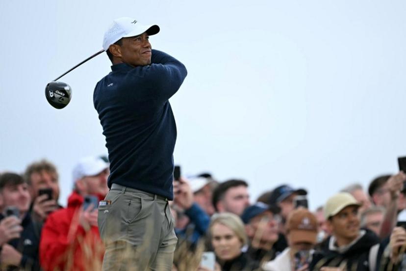 US golfer Tiger Woods watches his drive from the 4th tee during his second round, on day two of the 152nd British Open Golf Championship at Royal Troon on the south west coast of Scotland on July 19, 2024.  Paul ELLIS / AFP