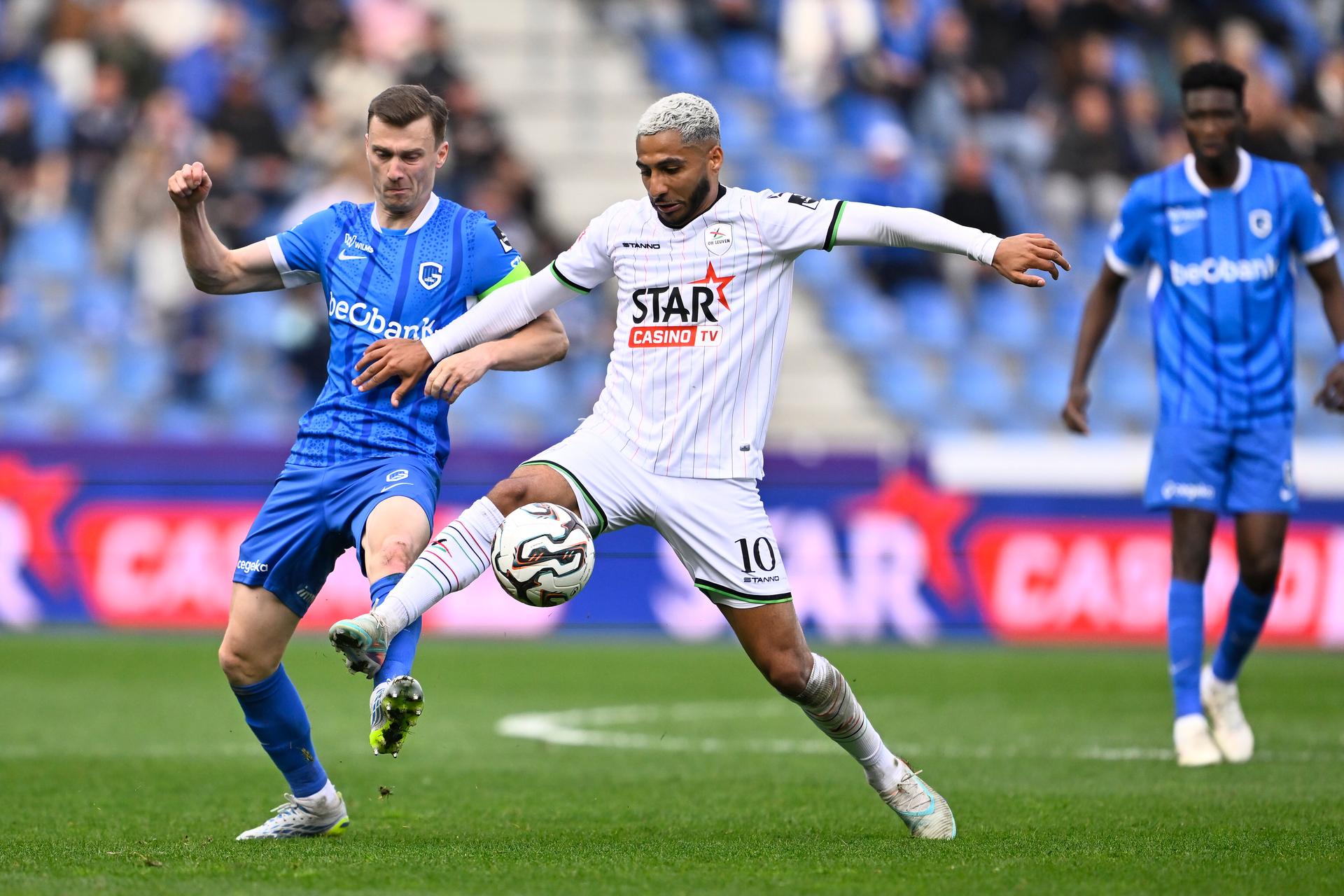 Genk's Bryan Heynen and OHL's Youssef Maziz fight for the ball during a soccer match between KRC Genk and Oud-Heverlee Leuven, Sunday 12 April 2026 in Heverlee, on the second day of the Europe Play-offs (PO 2) of the 2025-2026 'Jupiler Pro League' first division of the Belgian championship. BELGA PHOTO JOHAN EYCKENS