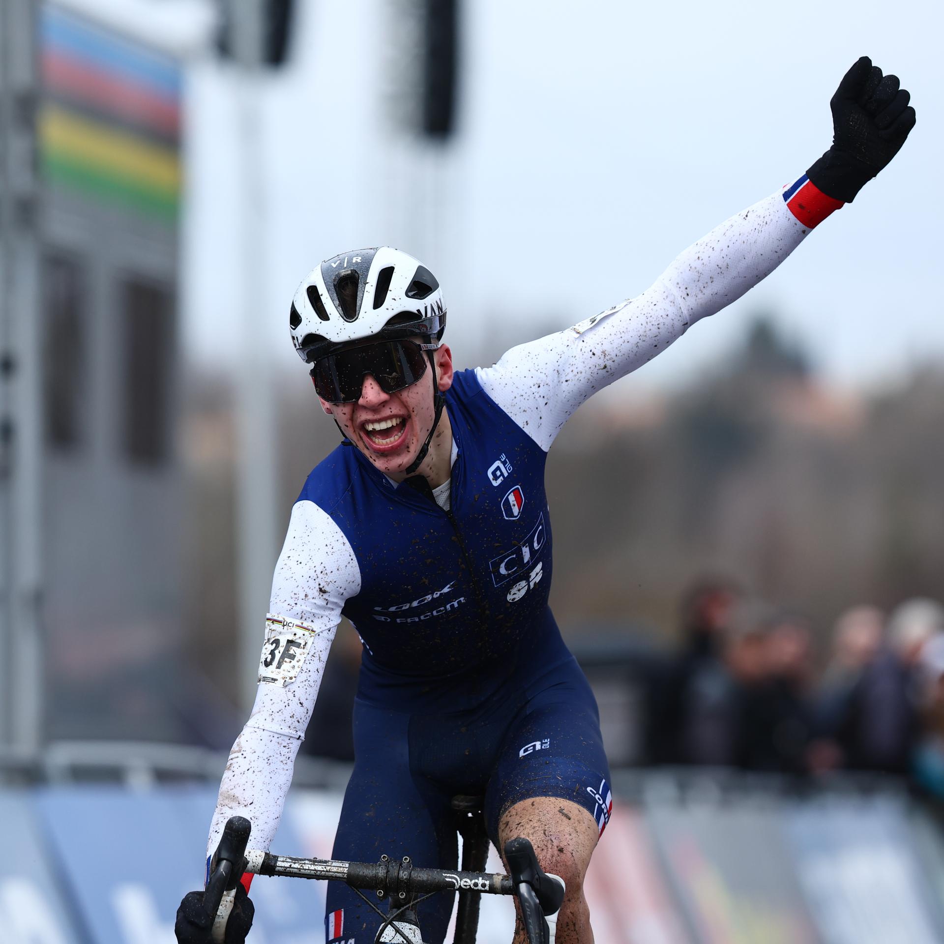 French Aubin Sparfel celebrates as he crosses the finish line to win the team relay event of the Cyclocross World Championships on Friday 02 February 2024  in Tabor, Czech Republic. BELGA PHOTO DAVID PINTENS