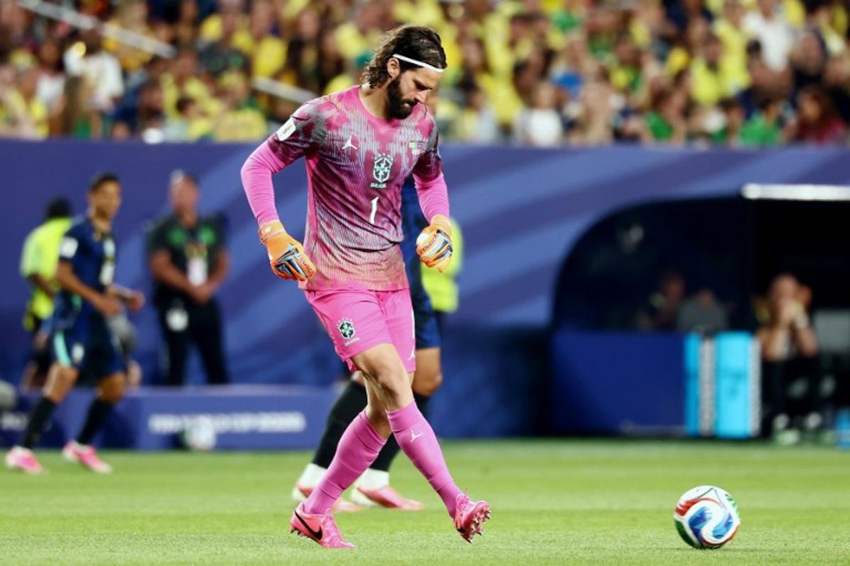Brazil's goalkeeper #01 Alisson controls the ball during the 2026 World Cup Group C football match between Brazil and Haiti at the Philadelphia Stadium in Philadelphia on June 19, 2026.   CHARLY TRIBALLEAU / AFP