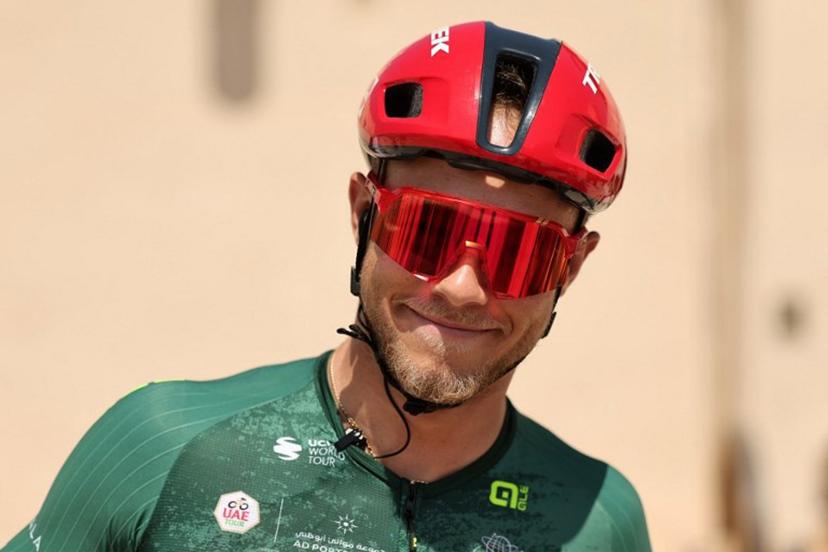 Lidl-Trek's Italian rider Jonathan Milan looks on before the sixth stage of the UAE Tour cycling event from al-Ain Museum to Jebel Hafeet in Abu Dhabi on February 21, 2026.  Fadel SENNA / AFP