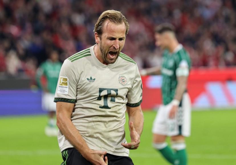 Bayern Munich's English forward #09 Harry Kane celebrates scoring a penalty during the German first division Bundesliga football match between Bayern Munich and Werder Bremen in Munich on Spetember 26, 2025.  Alexandra BEIER / AFP