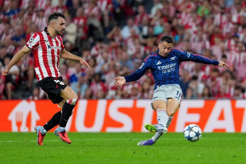 Arsenal's Brazilian forward #11 Gabriel Martinelli scores his team's first goal during the UEFA Champions League first round day 1 football match between Athletic Club Bilbao and Arsenal at the San Mames stadium in Bilbao on September 16, 2025.   Cesar MANSO / AFP