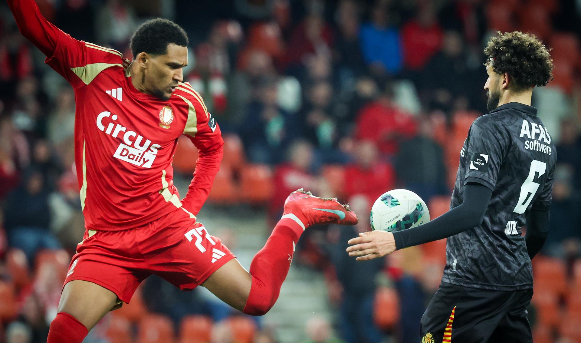 Standard's Andreas Hountondji and Mechelen's Ahmed Touba fight for the ball during a soccer match between Standard de Liege and KV Mechelen, Saturday 29 March 2025 in Liege, on day 1 (out of 10) of the Europe Play-offs of the 2024-2025 'Jupiler Pro League' first division of the Belgian championship. BELGA PHOTO VIRGINIE LEFOUR