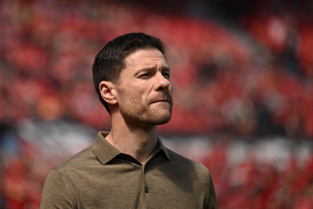 Bayer Leverkusen's Spanish head coach Xabi Alonso arrives prior to the German first division Bundesliga football match between Bayer 04 Leverkusen and FC Augsburg in Leverkusen, western Germany on April 26, 2025.  INA FASSBENDER / AFP