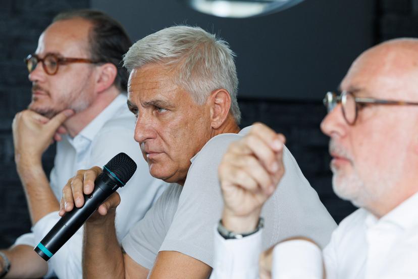 Thierry Dailly (C) pictured during a press conference on the takeover of Belgian Challenger Pro League 1B second division team RWDM, Monday 03 August 2026 in Brussels. BELGA PHOTO NICOLAS MAETERLINCK