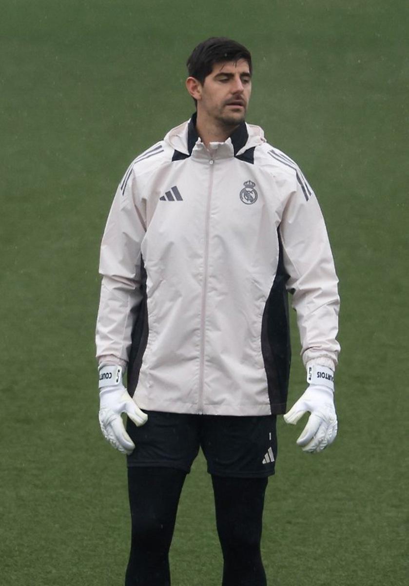 Real Madrid's Belgian goalkeeper #01 Thibaut Courtois attends a training session on the eve of the UEFA Champions League football match between Real Madrid CF and FC Salzburg at Real Madrid Sports City in Valdebebas, in the outskirts of Madrid, on January 21, 2025.  Pierre-Philippe MARCOU / AFP
