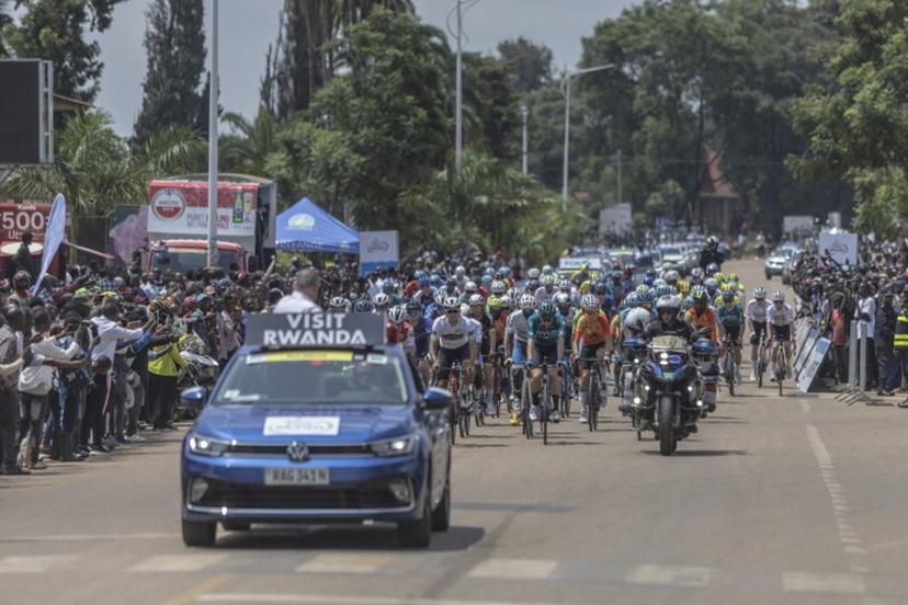 The pack rides at the start line of the third stage of the 16th Tour du Rwanda in Huye on February 20, 2024.    Guillem Sartorio / AFP