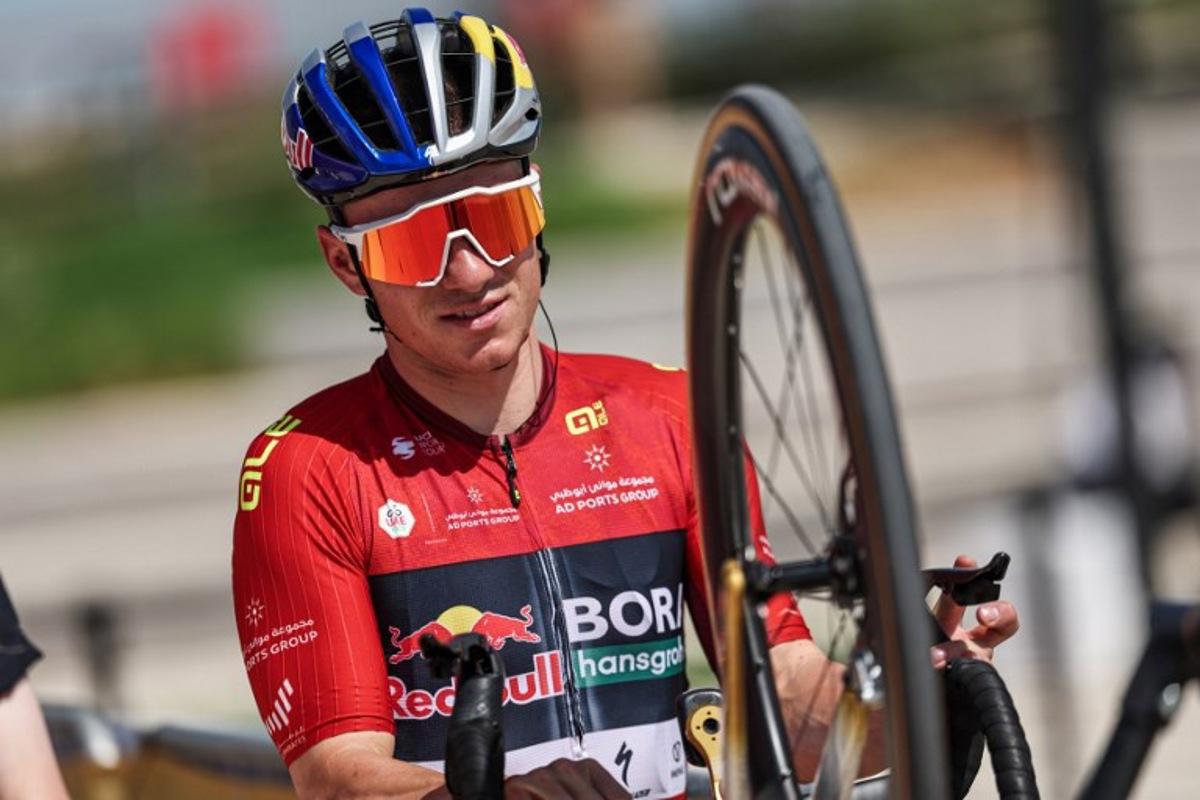Red Bull-Bora-Hansgrohe's Belgian rider Remco Evenepoel prepares for the third stage of the UAE Tour cycling event from Umm al-Quwain to Jebel Mobrah in Umm al-Quwain on February 18, 2026.  Fadel SENNA / AFP