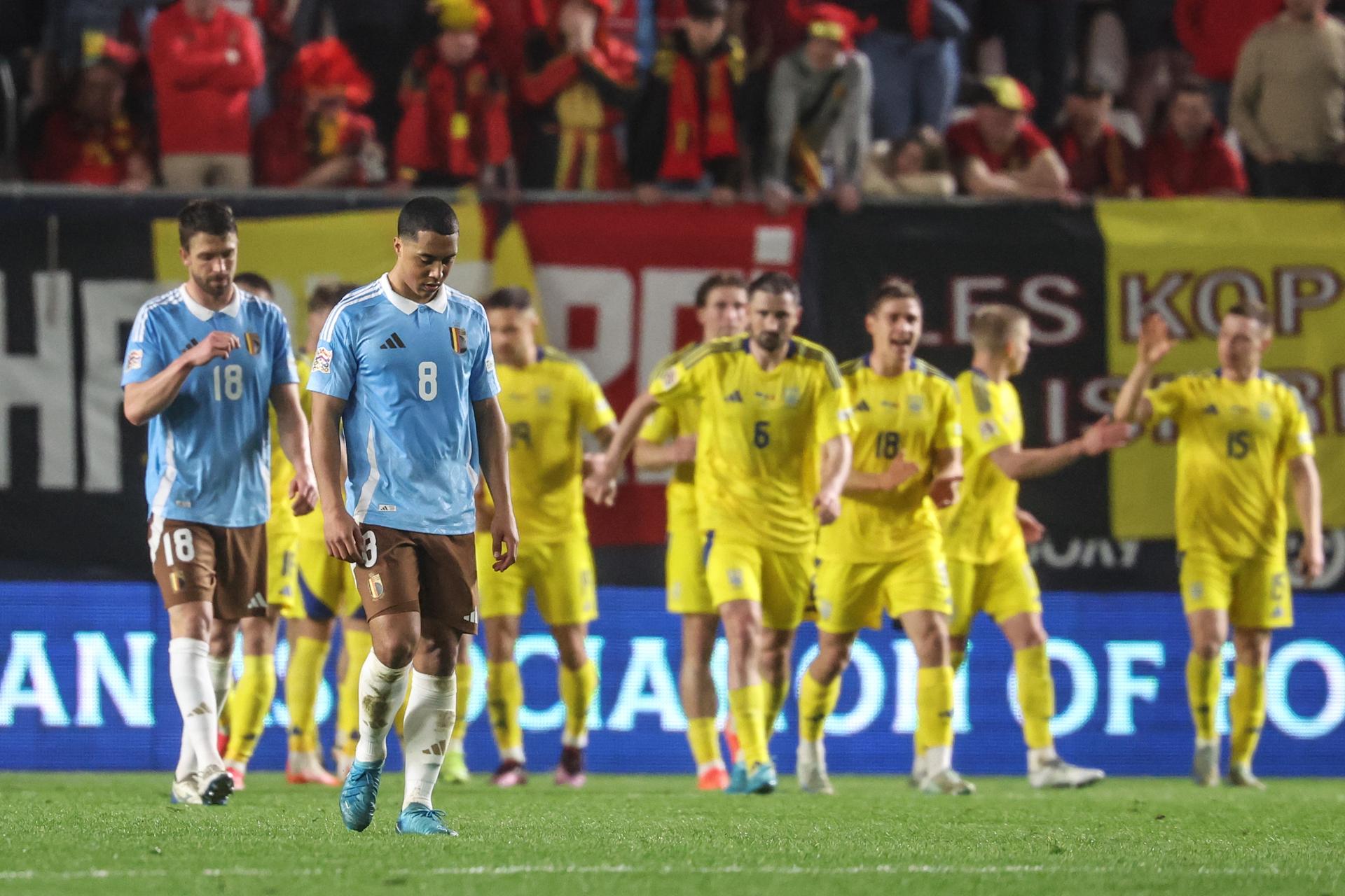 Belgium's Brandon Mechele and Belgium's Youri Tielemans look dejected during a soccer game between Belgian national team the Red Devils and Ukraine, Thursday 20 March 2025 in Murcia, Spain, the first leg of the play-offs in the Nations League. BELGA PHOTO VIRGINIE LEFOUR