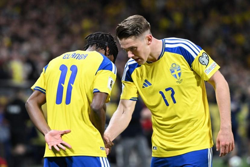 Sweden's midfielder #11 Anthony Elanga celebrates scoring his team's first goal with Sweden's forward #17 Viktor Gyokeres during the FIFA World Cup 2026 European qualification final football match between Sweden and Poland in Solna, Sweden, on March 31, 2026.  Jonathan Nackstrand / AFP