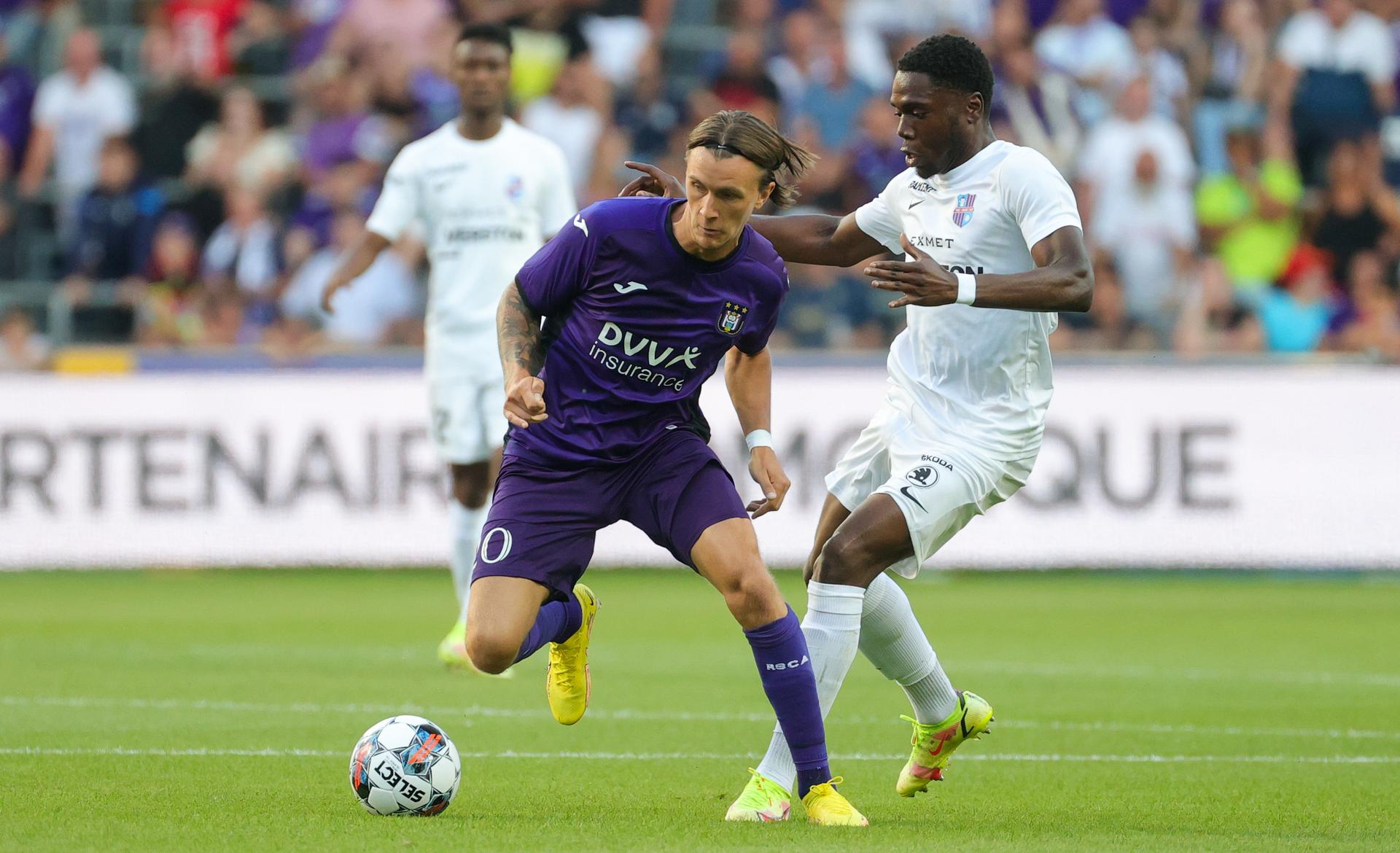 Anderlecht's Kristoffer Olsson and Paide's Dominique Simon fight for the ball during a soccer match between Belgian team RSC Anderlecht and Estonian team Paide Linnameeskond, Thursday 11 August 2022 in Brussels, the return leg in the third qualifying round of the UEFA Conference League competition. The first leg was won by Anderlecht 2-0. BELGA PHOTO VIRGINIE LEFOUR