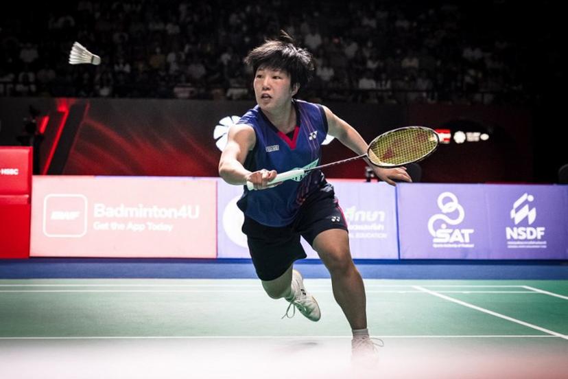 Japanese's Akane Yamaguchi plays a shot against Thailand's Pitchamon Opatniputh during their women's singles semi-final match at the Thailand Open badminton tournament in Bangkok on May 16, 2026.  chanakarn LAOSARAKHAM / AFP