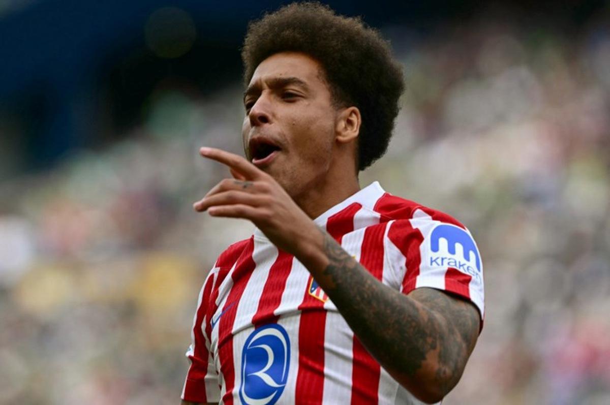 Atletico Madrid's Belgian midfielder #20 Axel Witsel celebrates scoring his team's second goal during the FIFA Club World Cup 2025 Group B football match between US Seattle Sounders and Spain's Atletico de Madrid at the Lumen Field stadium in Seattle on June 19, 2025.  Pablo PORCIUNCULA / AFP