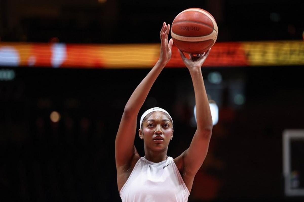 USA's forward #15 Angel Reese practises shooting during the warm up prior to the 2026 FIBA Women's Basketball World Cup quarter-final match between USA and Hungary at the Berlin Arena in Berlin on September 10, 2026.  Ronny HARTMANN / AFP