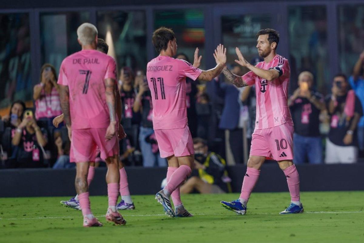 Inter Miami's Argentine forward Lionel Messi #10 celebrates his second goal during the Major League Soccer (MLS) non-conference regular season soccer match between Inter Miami CF and D.C United at Chase Stadium in Fort Lauderdale, Florida, on September 20, 2025.  Chris Arjoon / AFP