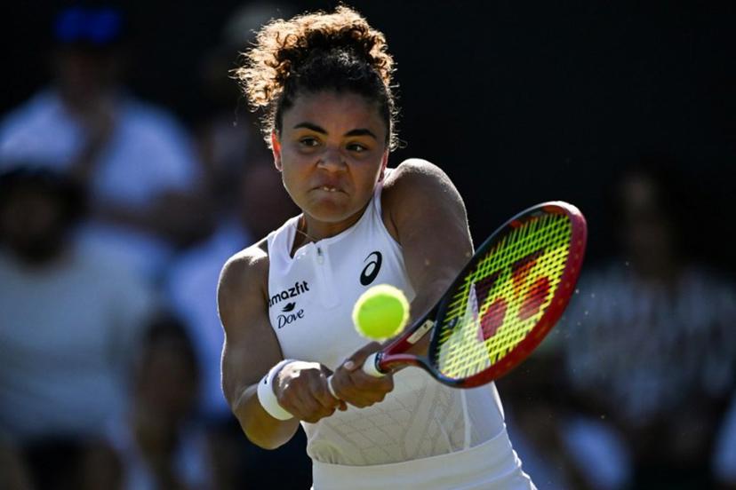 Italy's Jasmine Paolini plays a backhand return to Latvia's Anastasija Sevastova during their women's singles first round tennis match on the first day of the 2025 Wimbledon Championships at The All England Lawn Tennis and Croquet Club in Wimbledon, southwest London, on June 30, 2025.  Kirill KUDRYAVTSEV / AFP
