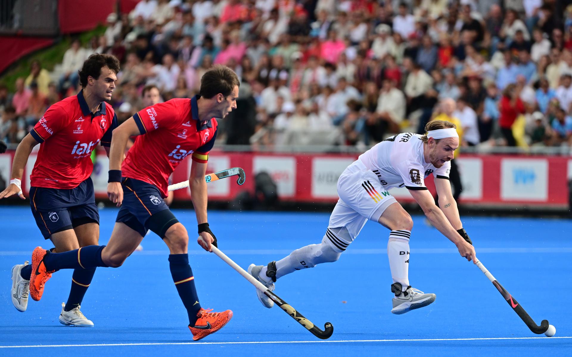 Spain's Marc Miralles and German Christopher Rühr in action during a field hockey game between Spain and Germany, the men's final at the 2026 Hockey World Cup, on Sunday 30 August 2026, in Wavre. The 2026 edition of the Hockey World Cup takes place in Belgium and The Netherlands from August 15 to August 30. BELGA PHOTO DIRK WAEM