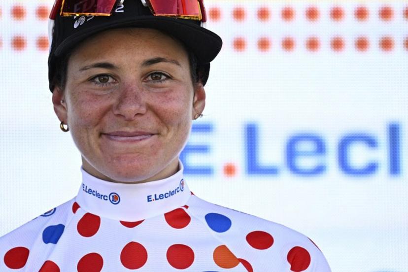 FDJ-SUEZ team's Swiss rider Elise Chabbey celebrates her polka dot best climber's jersey on the podium after the 7th stage (out of 9) of the fourth edition of the Women's Tour de France cycling race, 159.7 km from Bourg-en-Bresse to Chambéry, in Chambéry, south-eastern France on August 1, 2025.  JULIEN DE ROSA / AFP