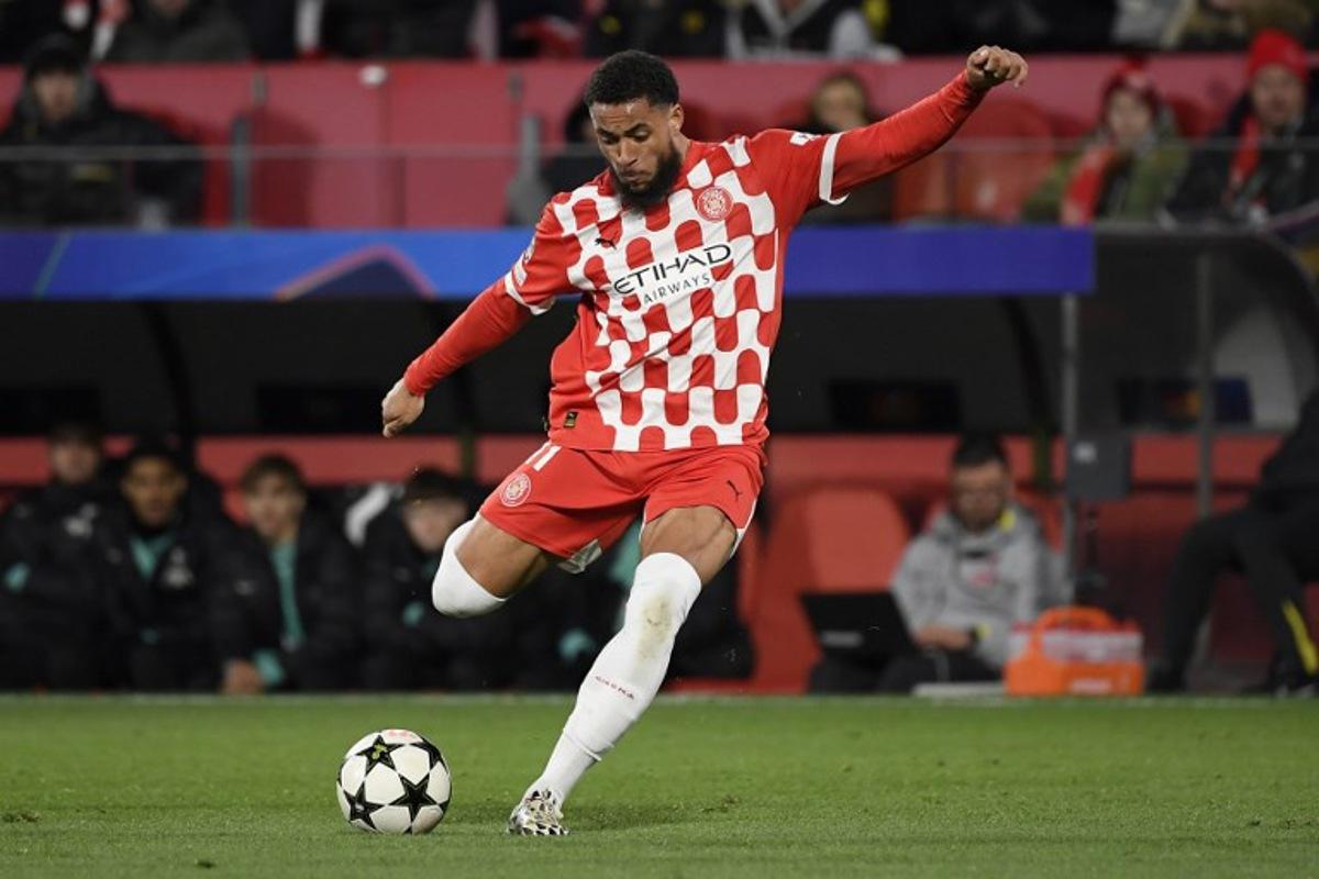 Girona Dutch forward #11 Arnaut Danjuma shoots during the UEFA Champions League, league phase football match between Girona FC and Liverpool FC at the Montilivi stadium in Girona on December 10, 2024.   Josep LAGO / AFP