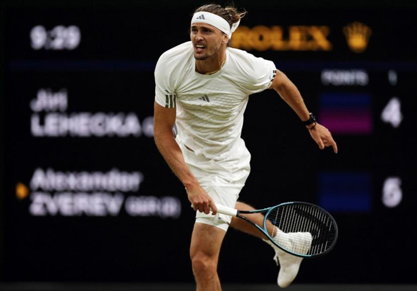 Germany's Alexander Zverev serves to Czech Republic's Jiri Lehecka during their men's singles round of 16 tennis match on the eighth day of the 2026 Wimbledon Championships at The All England Lawn Tennis and Croquet Club in Wimbledon, southwest London, on July 6, 2026.  Adrian Dennis / AFP