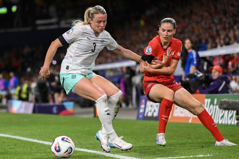 Iceland's forward #03 Sandra Jessen and Switzerland's midfielder #14 Smilla Vallotto fight for the ball during the UEFA Women's Euro 2025 Group A football match between Switzerland and Iceland at the Wankdorf stadium in Bern, on July 6, 2025.  SEBASTIEN BOZON / AFP