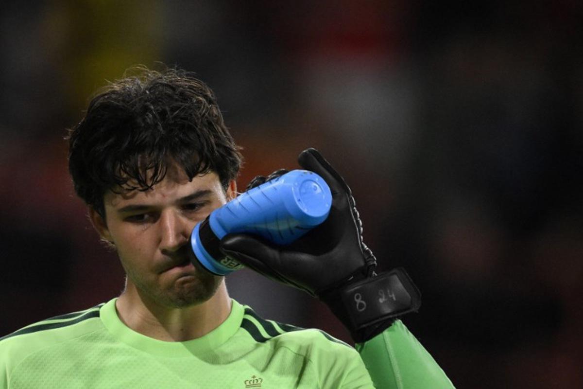 Belgium's goalkeeper #01 Senne Lammens drinks from his bottle during the UEFA Nations League, League A - Group 1, football match between Belgium and Turkey at the Maurice Dufrasne stadium, in Liege, eastern Belgium on October 2, 2026.  JOHN THYS / AFP