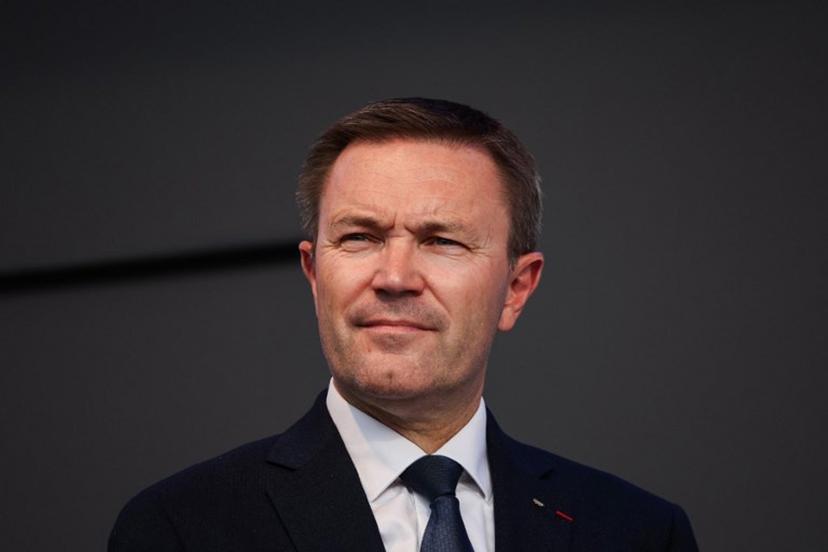 UCI President David Lappartient attends the medal ceremony following the men's Elite road race cycling event during the UCI 2025 Road World Championships, in Kigali, on September 28, 2025.  Anne-Christine POUJOULAT / AFP