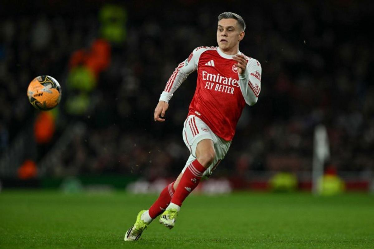 Arsenal's Belgian midfielder #19 Leandro Trossard eyes the ball during the English FA Cup fourth round football match between Arsenal and Wigan Athletic at the Emirates Stadium in London on February 15, 2026.   Glyn KIRK / AFP