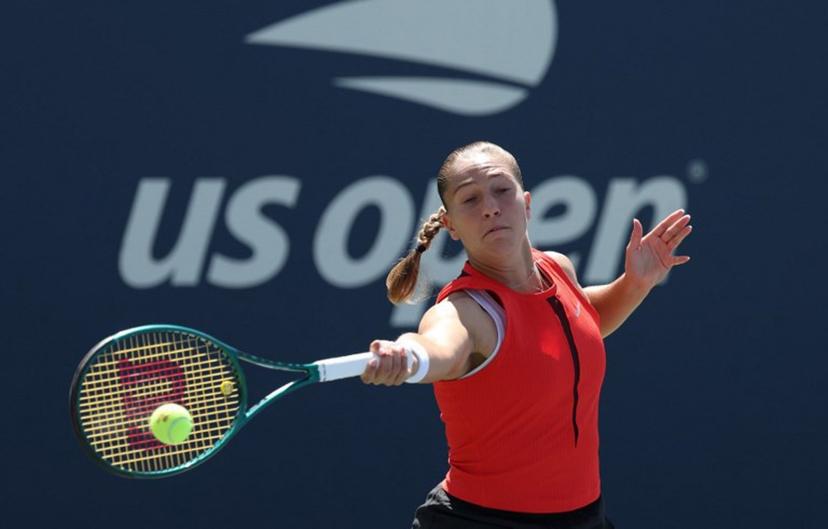 Diane Parry of France plays a shot to Ukraine's Marta Kostyuk during their women's singles third round match on day seven of the US Open tennis tournament at the USTA Billie Jean King National Tennis Center in New York City, on August 30, 2025.  TIMOTHY A. CLARY / AFP