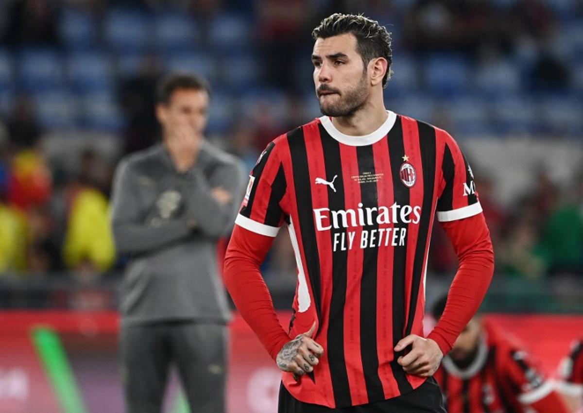 AC Milan's French defender #19 Theo Hernandez reacts at the end of the Italian Cup (Coppa Italia) final football match between AC Milan and Bologna at the Olympic stadium in Rome, on May 14, 2025.  Isabella BONOTTO / AFP