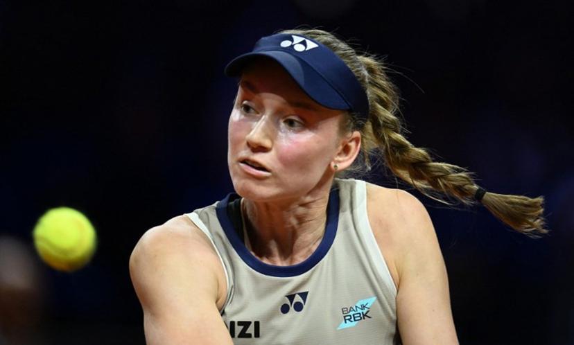 Kazakhstan's Elena Rybakina eyes the ball as she plays against Russia's Mirra Andreeva (not in picture) during their semifinal match at the Women's Tennis Grand Prix WTA tournament in Stuttgart, southwestern Germany, on April 18, 2026.  THOMAS KIENZLE / AFP