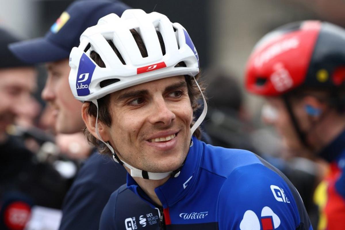 Groupama-FDJ's French rider Guillaume Martin looks on prior to the start of the 1st stage of the Paris-Nice cycling race, 156,1 km between Le Perray-en-Yvelines and Le Perray-en-Yvelines, on March 9, 2025. Anne-Christine POUJOULAT / AFP