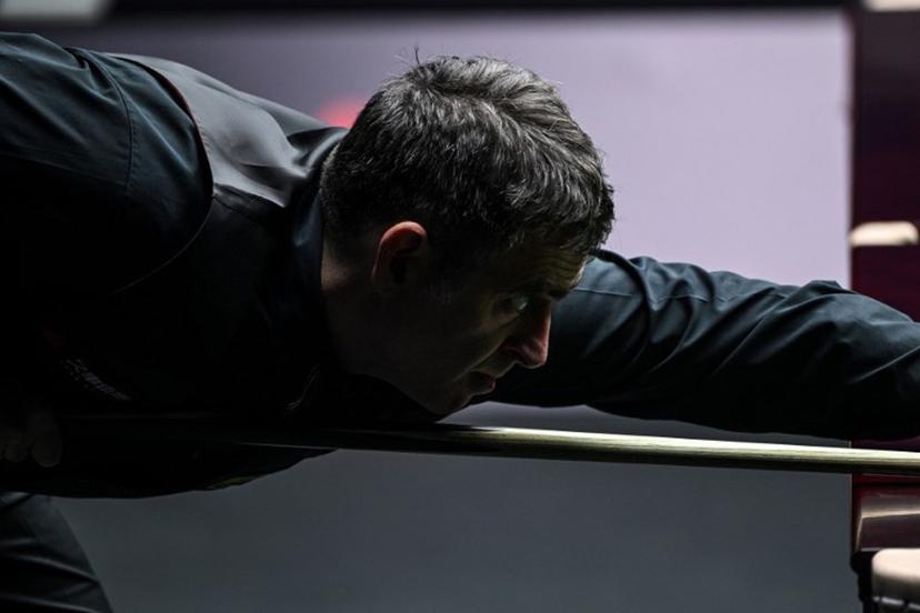 Britain's Ronnie O'Sullivan plays a shot during his match against Chinese Zhou Jinhao at the Shanghai Masters snooker tournament in Shanghai on July 16, 2024.  Hector RETAMAL / AFP