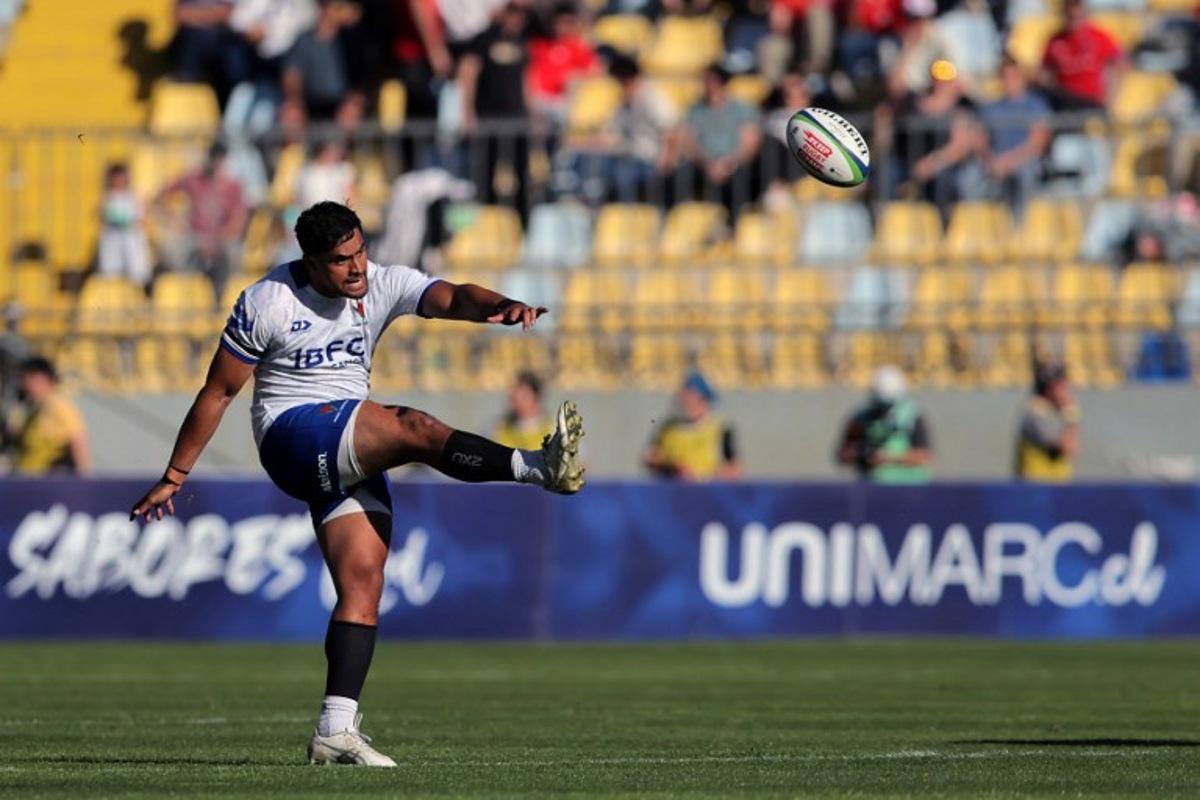 Samoa's fly half #10 Martini Talapusi kicks the ball during the Rugby World Cup Qualifying 2025 match between Chile and Samoa at the Sausalito Stadium in Vina del Mar, Chile, on September 27, 2025.  Javier TORRES / AFP