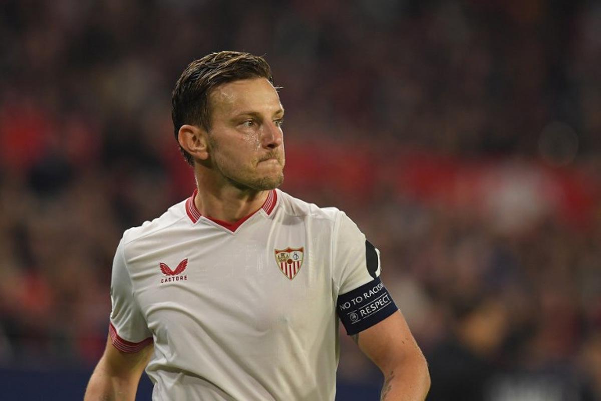 Sevilla's Croatian midfielder #10 Ivan Rakitic reacts during the UEFA Champions League first round group B football match between Sevilla FC and PSV Eindhoven at the Ramon Sanchez Pizjuan stadium in Seville on November 29, 2023.  JORGE GUERRERO / AFP