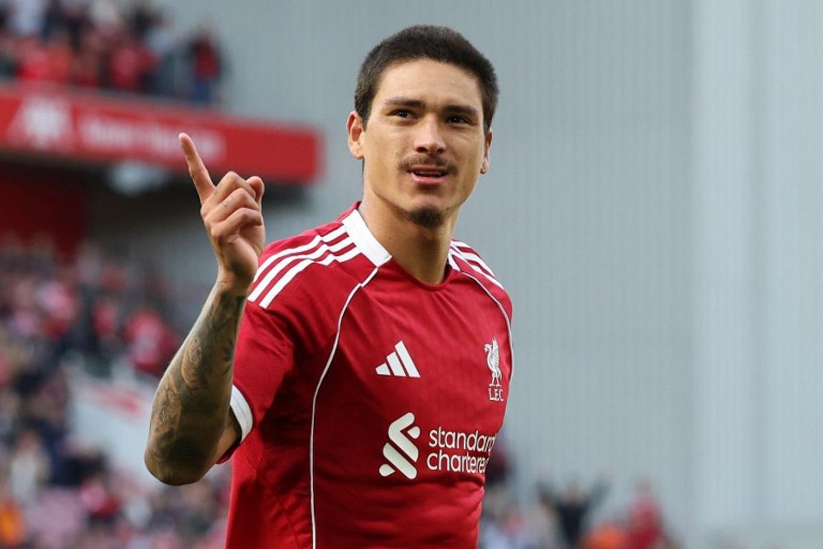 Liverpool's Uruguayan striker #09 Darwin Nunez celebrates scoring the team's second goal during the first of two pre season friendly football matches between Liverpool and Athletic Bilbao at Anfield in Liverpool, north west England on August 4, 2025.  Darren Staples / AFP