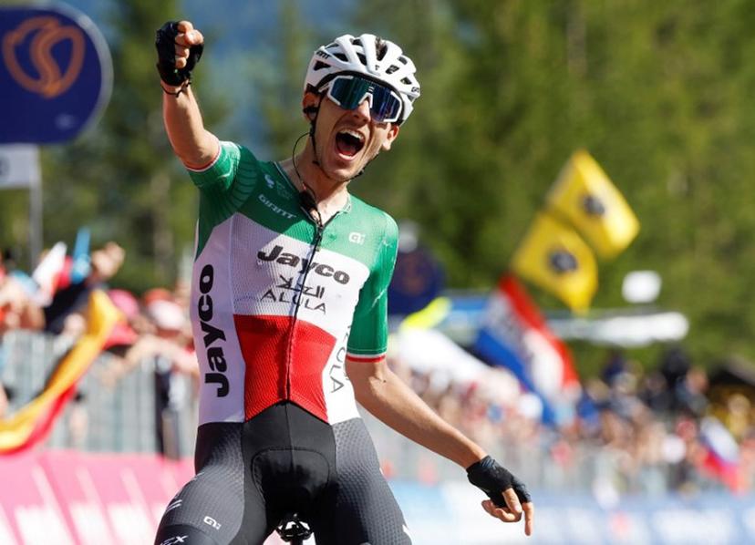 Team Jayco AlUla's Filippo Zana rider Filippo Zana celebrates as he wins the eighteenth stage of the Giro d'Italia 2023 cycling race, 161 km between Oderzo and Val di Zoldo, on May 25, 2023. . Luca BETTINI / AFP
