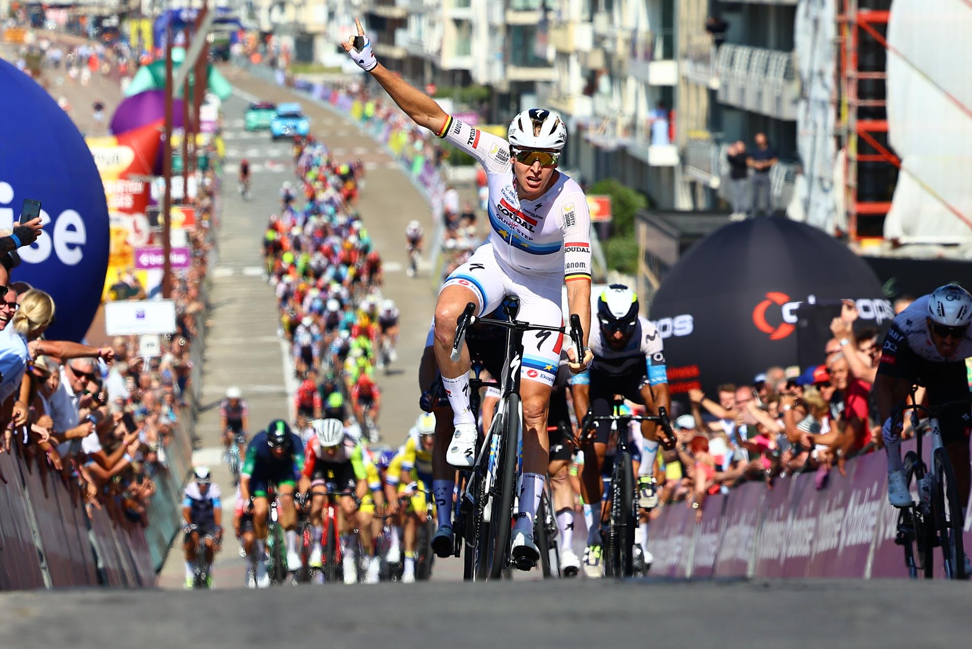 Belgian Jasper Philipsen of Alpecin-Deceuninck celebrates as he crosses the finish line to win the first stage of the Baloise Belgium Tour cycling race, 198km from Merelbeke-Melle to Knokke-Heist, Wednesday 18 June 2025. The Baloise Belgium Tour takes place from 18 to 22 June. BELGA PHOTO DAVID PINTENS