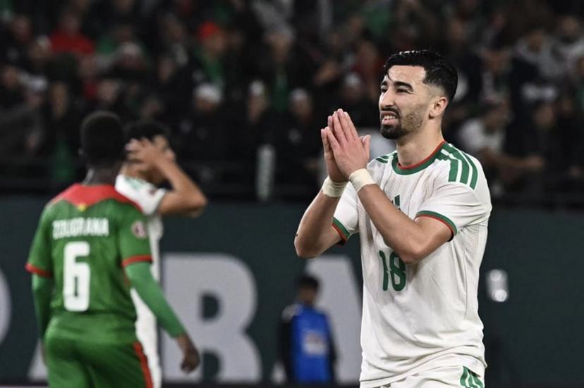 Algeria's forward #18 Mohamed Amoura (R) gestures during the Africa Cup of Nations (CAN) Group E football match between Algeria and Burkino Faso at Moulay Hassan Stadium in Rabat on December 28, 2025.   Paul ELLIS / AFP
