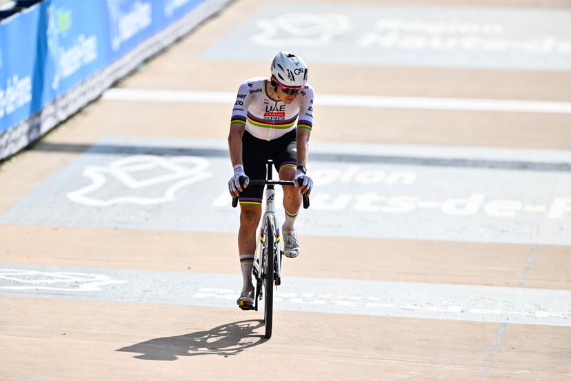 Slovenian Tadej Pogacar of UAE Team Emirates crosses the finish line of the men elite race of the 'Paris-Roubaix' one day cycling race, 259,2 km from Compiegne to Roubaix, France, on Sunday 13 April 2025. BELGA PHOTO ERIC LALMAND