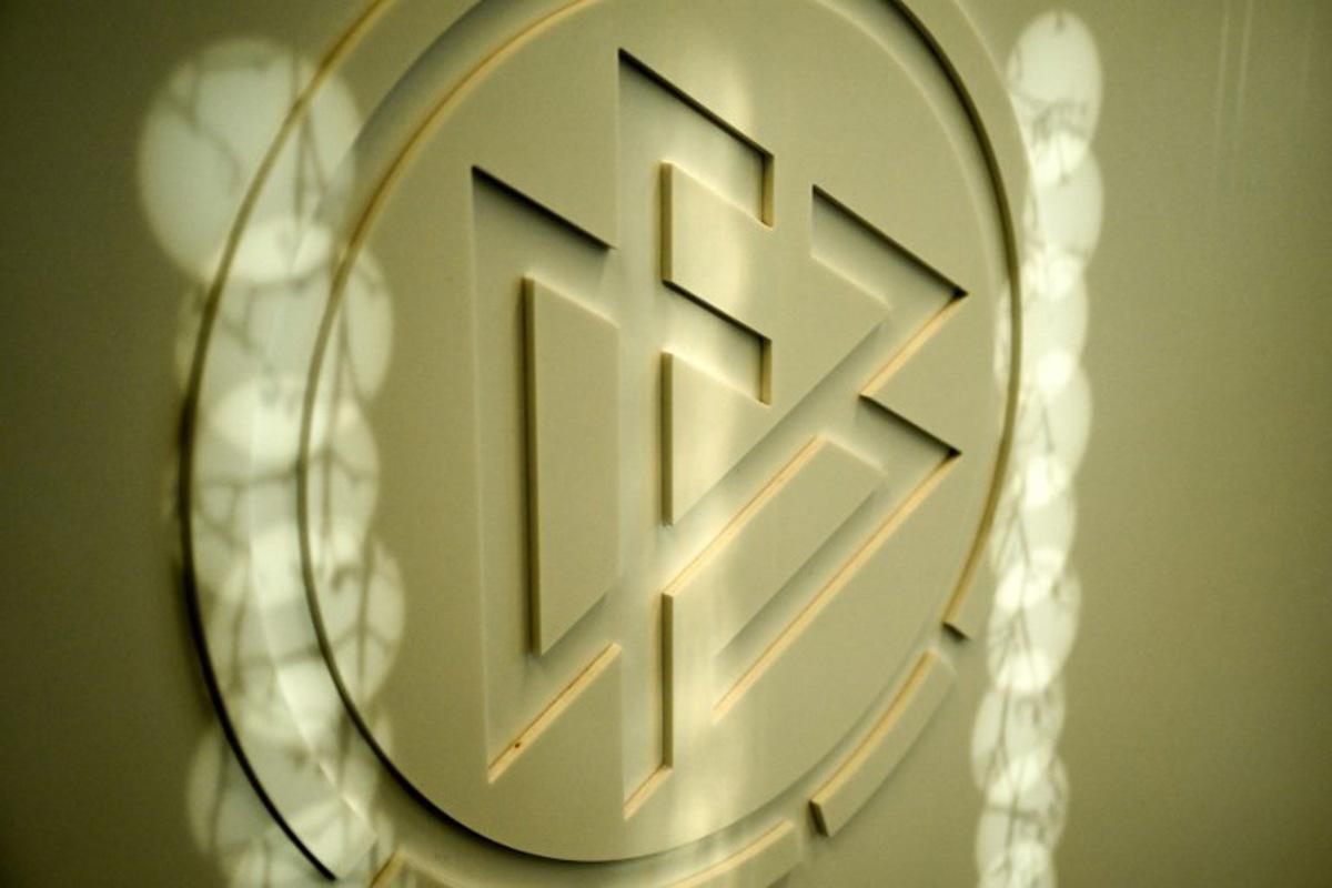 The logo of the German Football Association (DFB) is pictured on the sidelines of a training session of the German national football team on November 15, 2023 in Frankfurt am Main, western Germany, in preparation of the team's international friendly football match Germany v Turkey to take place on November 18, 2023.  Kirill KUDRYAVTSEV / AFP