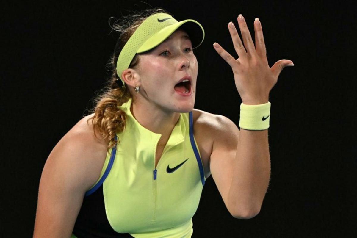 Russia's Mirra Andreeva reacts after a point against Ukraine's Elina Svitolina during their women's singles match on day eight of the Australian Open tennis tournament in Melbourne on January 25, 2026.  WILLIAM WEST / AFP