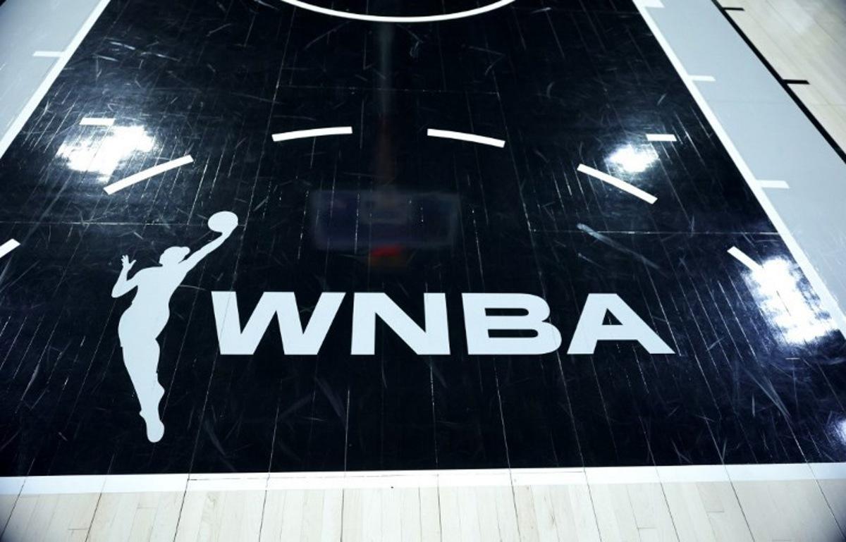 A WNBA logo is shown on the court before a game between the Connecticut Sun and the Las Vegas Aces at Michelob ULTRA Arena on June 25, 2025 in Las Vegas, Nevada.  NOTE TO USER: User expressly acknowledges and agrees that, by downloading and or using this photograph, User is consenting to the terms and conditions of the Getty Images License Agreement. WNBA players have given their backing to calling a strike "when necessary" as negotiations over a new collective bargaining agreement continue, union chiefs said on December 18, 2025. The Women's National Basketball Players Association said in a statement its members had voted in favor of authorizing the union's leadership to call a strike if needed.  Ethan Miller / GETTY IMAGES NORTH AMERICA / AFP