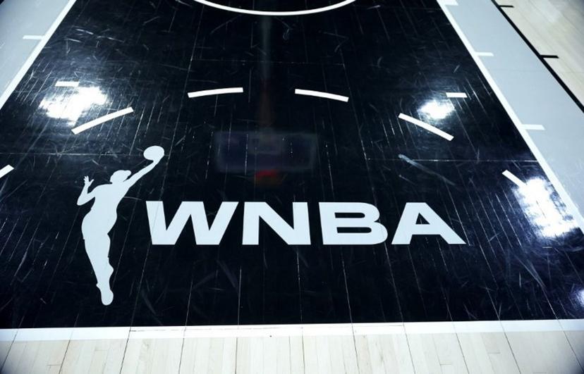 A WNBA logo is shown on the court before a game between the Connecticut Sun and the Las Vegas Aces at Michelob ULTRA Arena on June 25, 2025 in Las Vegas, Nevada.  NOTE TO USER: User expressly acknowledges and agrees that, by downloading and or using this photograph, User is consenting to the terms and conditions of the Getty Images License Agreement. WNBA players have given their backing to calling a strike "when necessary" as negotiations over a new collective bargaining agreement continue, union chiefs said on December 18, 2025. The Women's National Basketball Players Association said in a statement its members had voted in favor of authorizing the union's leadership to call a strike if needed.  Ethan Miller / GETTY IMAGES NORTH AMERICA / AFP