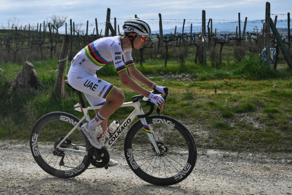 Team UAE's Slovenain rider Tadej Pogacar rides during the 19th one-day classic Strade Bianche (White Roads) men's cycling race between Siena and Siena in Tuscany on March 8, 2025.  Marco BERTORELLO / AFP