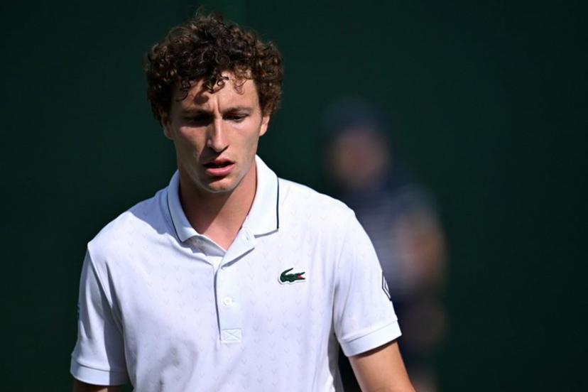 France's Ugo Humbert reacts whilst playing against Belgium's Zizou Bergs during their men's singles first round tennis match on the second day of the 2026 Wimbledon Championships at The All England Lawn Tennis and Croquet Club in Wimbledon, southwest London, on June 30, 2026.  Kirill KUDRYAVTSEV / AFP