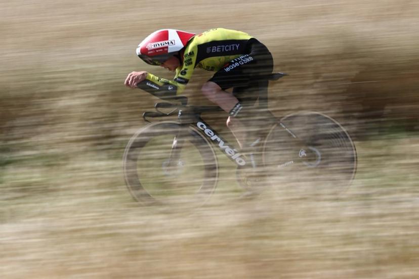 Team Visma | Lease a Bike's Danish rider Jonas Vingegaard cycles during the 4th stage of the 77th edition of the Criterium du Dauphine cycling race, a 17,4 km individual time trial between Charmes-sur-Rhône and Saint-Péray, on June 11, 2025.  Anne-Christine POUJOULAT / AFP