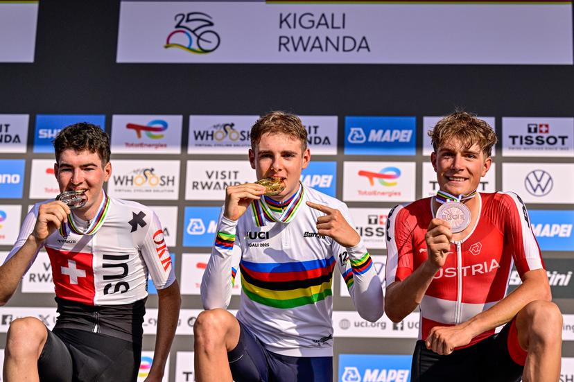 Marco Schrettl, Italian Lorenzo Finn and Jan Huber pictured on the podium after the u23 men road race (164,6 km) at the cycling road World Championships in Kigali, Rwanda, Friday 26 September 2025. The 2025 UCI Road World Championships take place from 21 to 28 September in Kigali, Rwanda. BELGA PHOTO DIRK WAEM